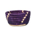 Corbeilles multifonctionnelles rondes faites à la main en fibre de palmier naturelle bicolore.